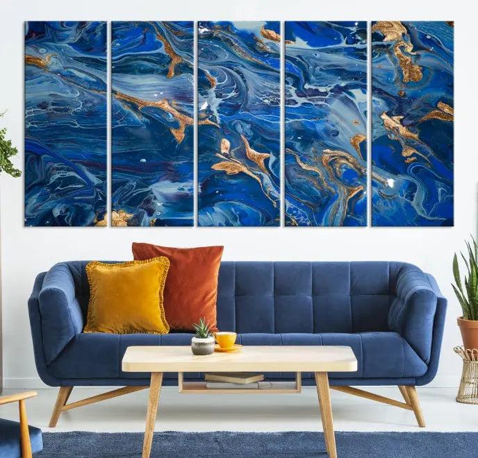 Adorn the space above your couch with the "Navy Blue Marble Fluid Effect Wall Art Abstract Canvas Wall Art Print," featuring exquisite blue and gold swirling patterns on museum-quality canvases.