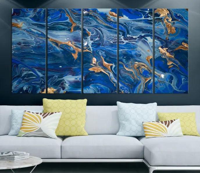 Adorn the space above your couch with the "Navy Blue Marble Fluid Effect Wall Art Abstract Canvas Wall Art Print," featuring exquisite blue and gold swirling patterns on museum-quality canvases.