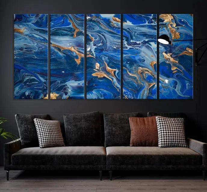 Adorn the space above your couch with the "Navy Blue Marble Fluid Effect Wall Art Abstract Canvas Wall Art Print," featuring exquisite blue and gold swirling patterns on museum-quality canvases.