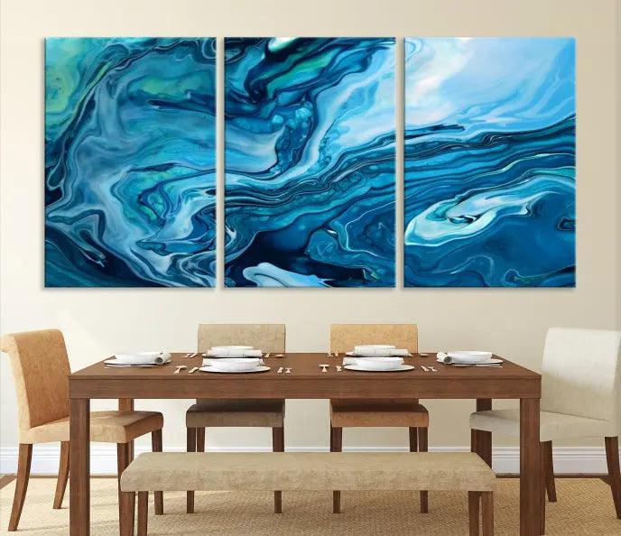 A triptych of the Navy Blue Marble Fluid Effect Wall Art Abstract Canvas Print, featuring swirling blue patterns, graces the space. These pieces are crafted on museum-quality canvas and gallery wrapped with a UV-protective coating to ensure longevity.