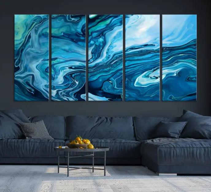 A triptych of the Navy Blue Marble Fluid Effect Wall Art Abstract Canvas Print, featuring swirling blue patterns, graces the space. These pieces are crafted on museum-quality canvas and gallery wrapped with a UV-protective coating to ensure longevity.