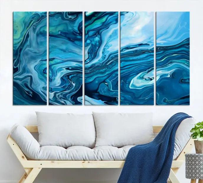 A triptych of the Navy Blue Marble Fluid Effect Wall Art Abstract Canvas Print, featuring swirling blue patterns, graces the space. These pieces are crafted on museum-quality canvas and gallery wrapped with a UV-protective coating to ensure longevity.