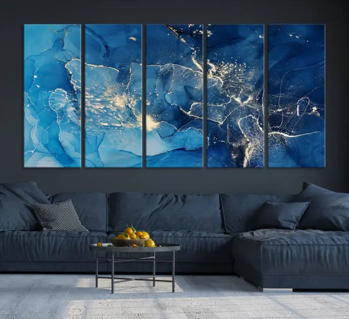 A modern living room features the "Navy Blue Marble Fluid Effect Wall Art Abstract Canvas Wall Art Print" above a white sofa. The museum-quality canvas adds an effortless touch of elegance.