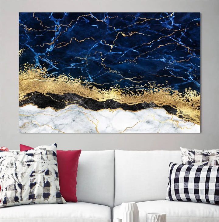 The living room is adorned with the Navy Blue Marble Fluid Effect Wall Art Abstract Canvas Wall Art Print. This ready-to-hang three-panel artwork features blue, gold, and white tones on museum-quality canvas with a UV-protective coating.