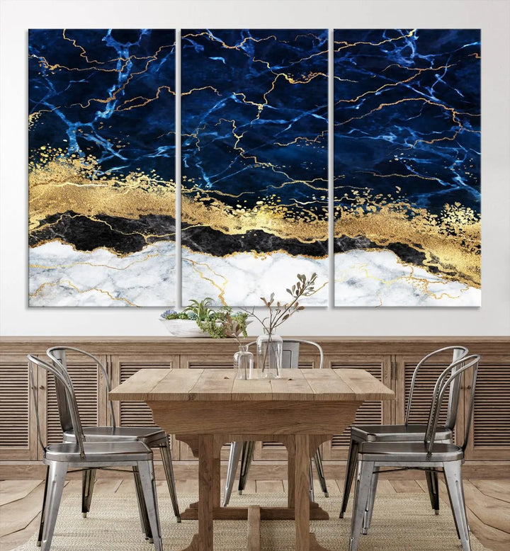 The living room is adorned with the Navy Blue Marble Fluid Effect Wall Art Abstract Canvas Wall Art Print. This ready-to-hang three-panel artwork features blue, gold, and white tones on museum-quality canvas with a UV-protective coating.