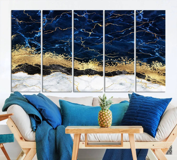 The living room is adorned with the Navy Blue Marble Fluid Effect Wall Art Abstract Canvas Wall Art Print. This ready-to-hang three-panel artwork features blue, gold, and white tones on museum-quality canvas with a UV-protective coating.