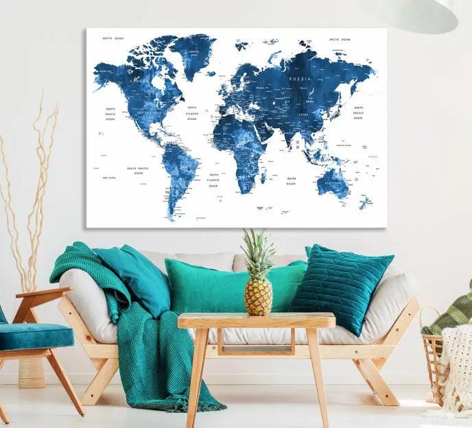 A contemporary living room radiating sophistication showcases the Navy Blue Wall Art World Map Canvas Print, framed and ready to hang.