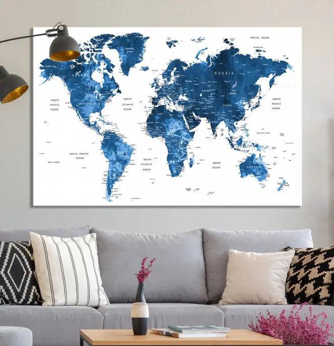 A contemporary living room radiating sophistication showcases the Navy Blue Wall Art World Map Canvas Print, framed and ready to hang.