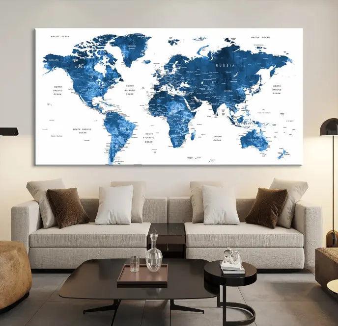 A contemporary living room radiating sophistication showcases the Navy Blue Wall Art World Map Canvas Print, framed and ready to hang.