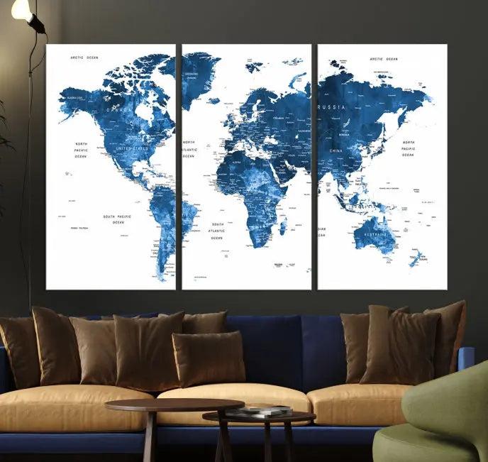 A contemporary living room radiating sophistication showcases the Navy Blue Wall Art World Map Canvas Print, framed and ready to hang.