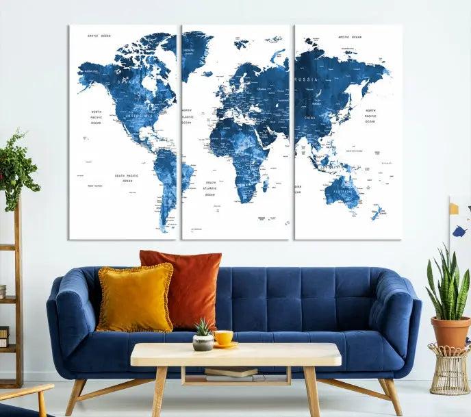 A contemporary living room radiating sophistication showcases the Navy Blue Wall Art World Map Canvas Print, framed and ready to hang.