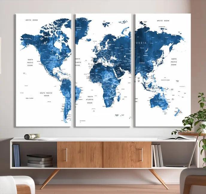 A contemporary living room radiating sophistication showcases the Navy Blue Wall Art World Map Canvas Print, framed and ready to hang.