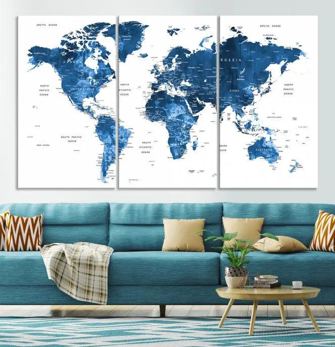 A contemporary living room radiating sophistication showcases the Navy Blue Wall Art World Map Canvas Print, framed and ready to hang.