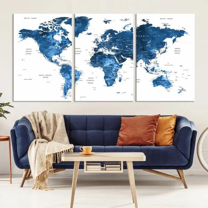 A contemporary living room radiating sophistication showcases the Navy Blue Wall Art World Map Canvas Print, framed and ready to hang.