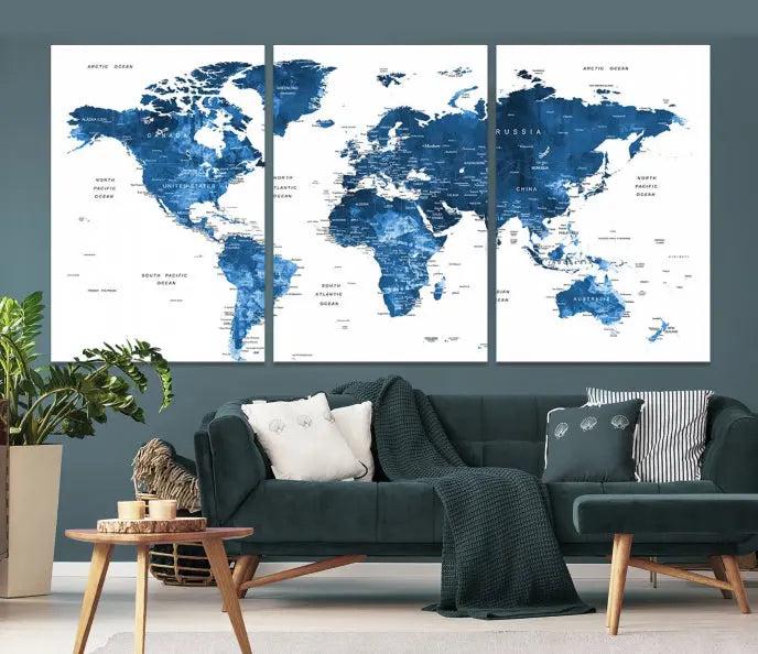 A contemporary living room radiating sophistication showcases the Navy Blue Wall Art World Map Canvas Print, framed and ready to hang.