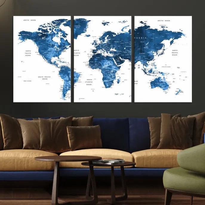 A contemporary living room radiating sophistication showcases the Navy Blue Wall Art World Map Canvas Print, framed and ready to hang.