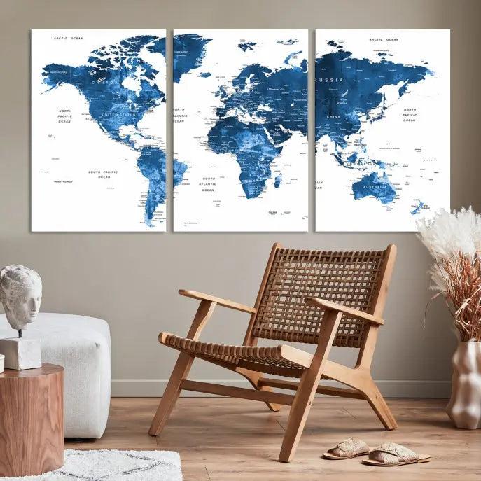 A contemporary living room radiating sophistication showcases the Navy Blue Wall Art World Map Canvas Print, framed and ready to hang.