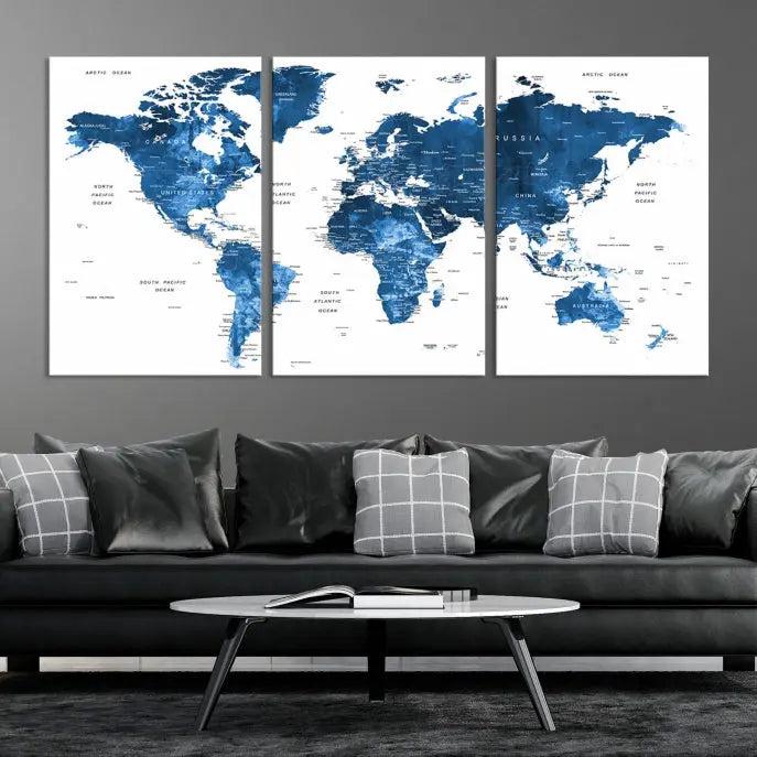 A contemporary living room radiating sophistication showcases the Navy Blue Wall Art World Map Canvas Print, framed and ready to hang.