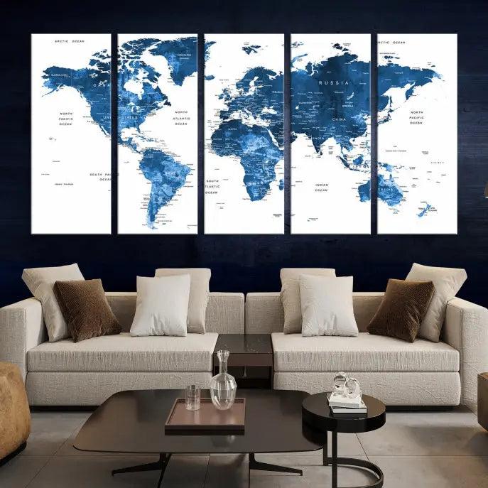 A contemporary living room radiating sophistication showcases the Navy Blue Wall Art World Map Canvas Print, framed and ready to hang.