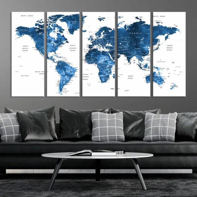 A contemporary living room radiating sophistication showcases the Navy Blue Wall Art World Map Canvas Print, framed and ready to hang.