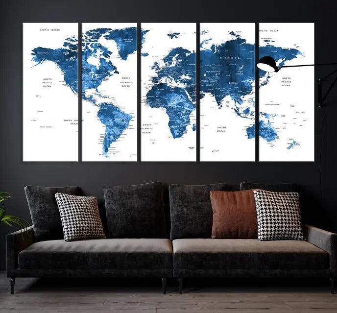 A contemporary living room radiating sophistication showcases the Navy Blue Wall Art World Map Canvas Print, framed and ready to hang.