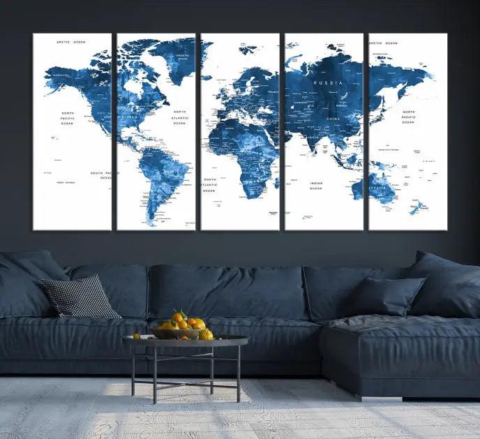 A contemporary living room radiating sophistication showcases the Navy Blue Wall Art World Map Canvas Print, framed and ready to hang.