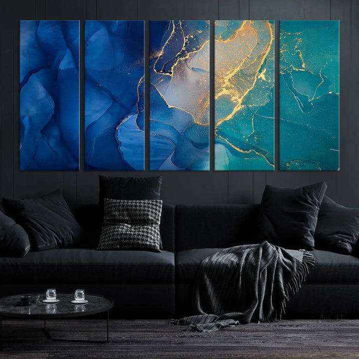 A Navy Blue and Green Marble Fluid Effect Wall Art Abstract Canvas Wall Art Print, featuring captivating patterns of blue and teal hues interlaced with gold veining, is ready to hang and protected by a UV-coating to preserve its vibrant colors over time.