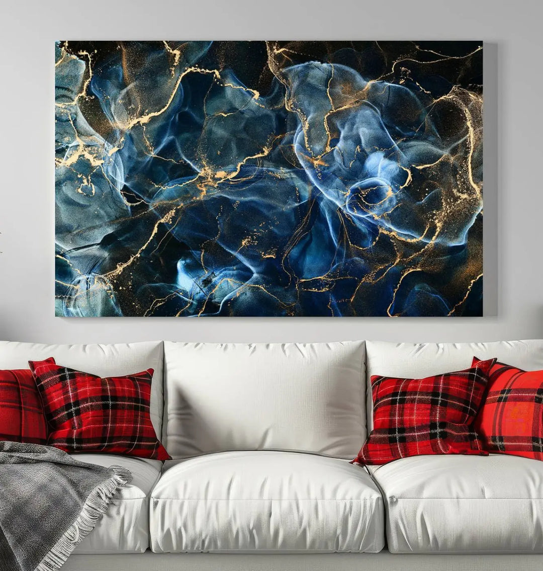 The Navy Blue and Smokey Marble Fluid Effect Abstract Canvas Wall Art Print features a swirling blue and gold pattern in a gallery-wrapped, museum-quality design.