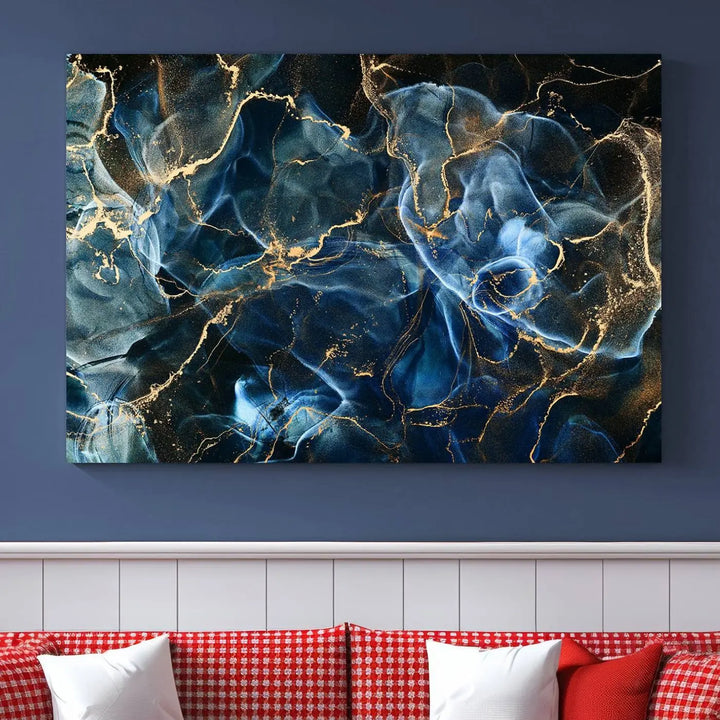 The Navy Blue and Smokey Marble Fluid Effect Abstract Canvas Wall Art Print features a swirling blue and gold pattern in a gallery-wrapped, museum-quality design.