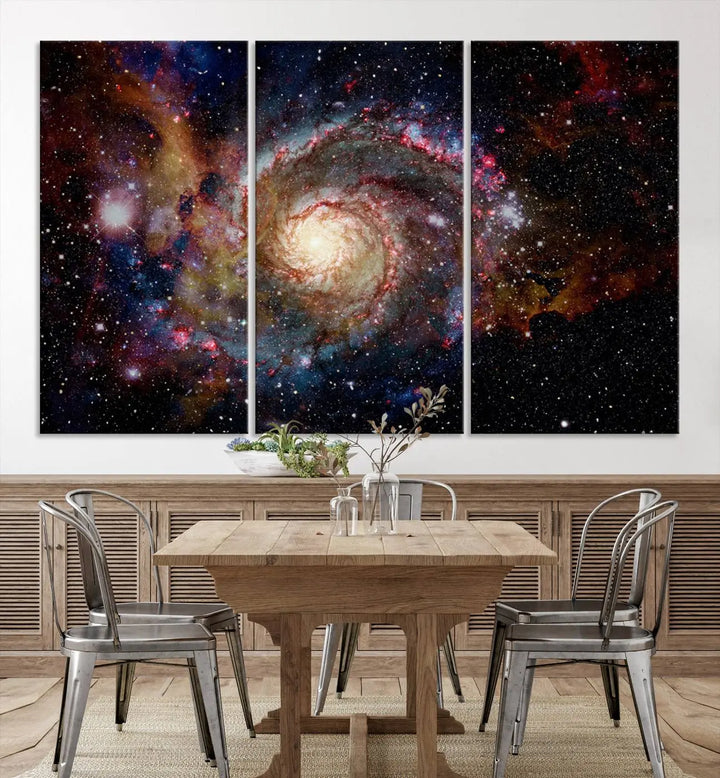 The modern living room is adorned with the Nebula and Galaxies in Space Wall Art, a spiral galaxy canvas print that showcases high-resolution details on museum-quality canvas. The UV-protective coating ensures its stunning allure is preserved.