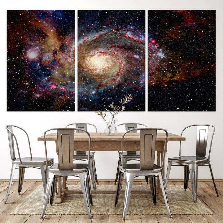 The modern living room is adorned with the Nebula and Galaxies in Space Wall Art, a spiral galaxy canvas print that showcases high-resolution details on museum-quality canvas. The UV-protective coating ensures its stunning allure is preserved.