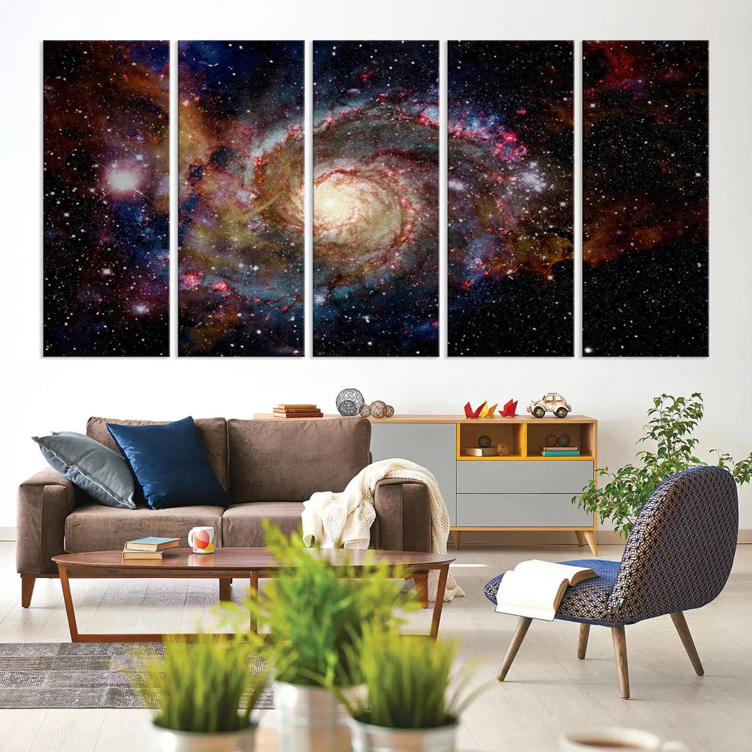 The modern living room is adorned with the Nebula and Galaxies in Space Wall Art, a spiral galaxy canvas print that showcases high-resolution details on museum-quality canvas. The UV-protective coating ensures its stunning allure is preserved.