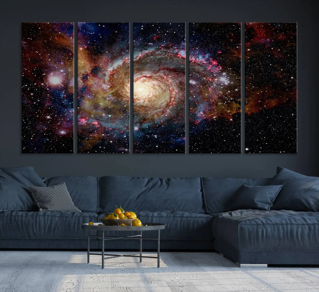 The modern living room is adorned with the Nebula and Galaxies in Space Wall Art, a spiral galaxy canvas print that showcases high-resolution details on museum-quality canvas. The UV-protective coating ensures its stunning allure is preserved.