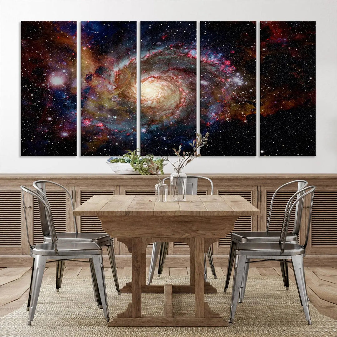 The modern living room is adorned with the Nebula and Galaxies in Space Wall Art, a spiral galaxy canvas print that showcases high-resolution details on museum-quality canvas. The UV-protective coating ensures its stunning allure is preserved.