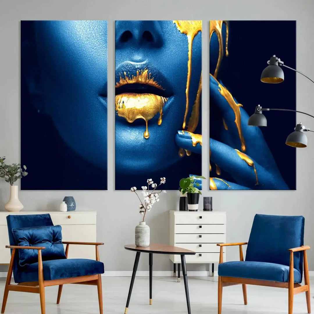 A modern living room showcases the "Neon Blue Gold Lips Photography Canvas Wall Art Print Fashion Art Beauty," depicting a blue face with golden accents reminiscent of vibrant contemporary lip art.