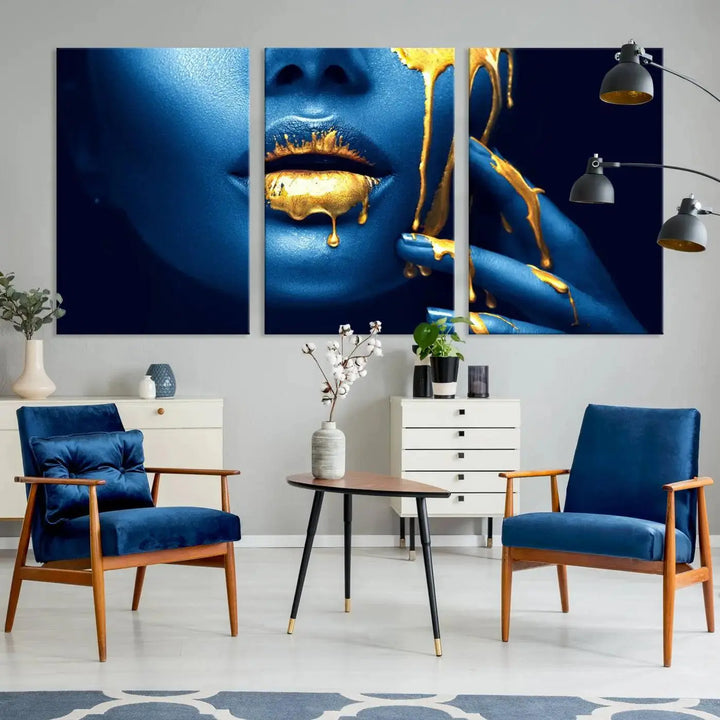 A modern living room showcases the "Neon Blue Gold Lips Photography Canvas Wall Art Print Fashion Art Beauty," depicting a blue face with golden accents reminiscent of vibrant contemporary lip art.