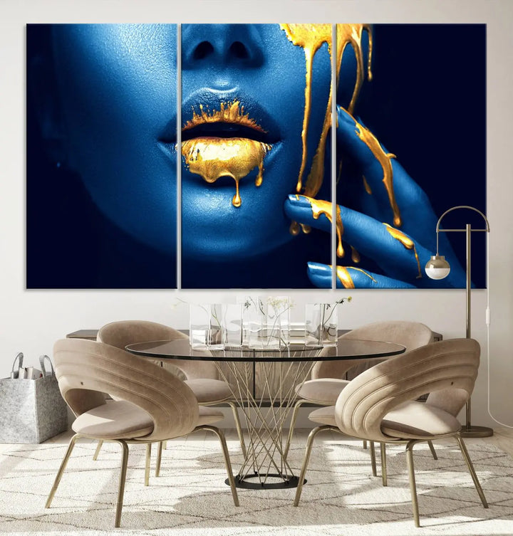 A modern living room showcases the "Neon Blue Gold Lips Photography Canvas Wall Art Print Fashion Art Beauty," depicting a blue face with golden accents reminiscent of vibrant contemporary lip art.