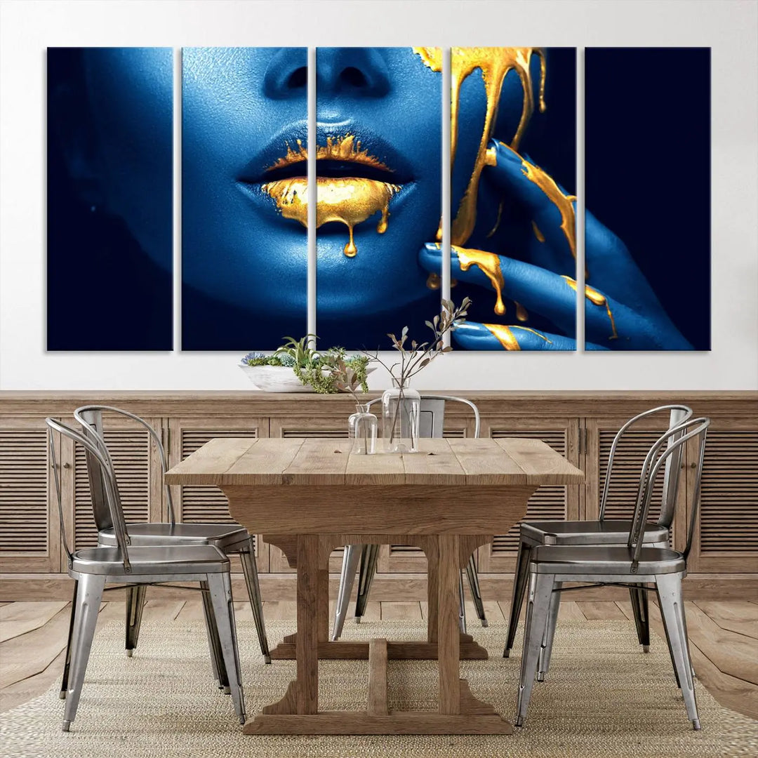 A modern living room showcases the "Neon Blue Gold Lips Photography Canvas Wall Art Print Fashion Art Beauty," depicting a blue face with golden accents reminiscent of vibrant contemporary lip art.