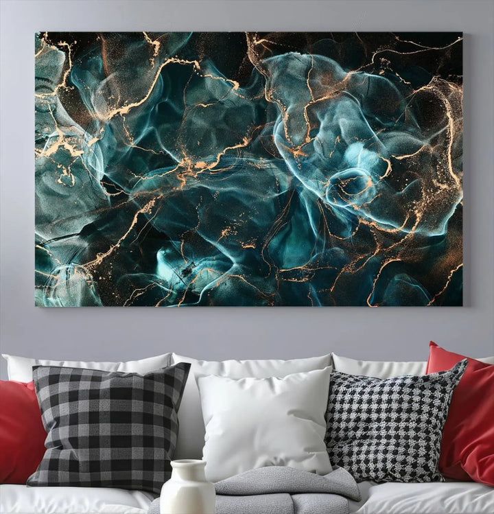 The "Neon Blue Marble Smokey Effect" abstract canvas wall art print, adorned with teal and gold swirls, is professionally hand-assembled with a UV-protective coating.