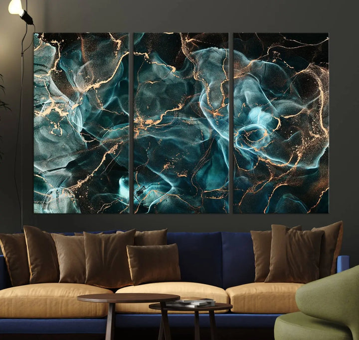 The "Neon Blue Marble Smokey Effect" abstract canvas wall art print, adorned with teal and gold swirls, is professionally hand-assembled with a UV-protective coating.