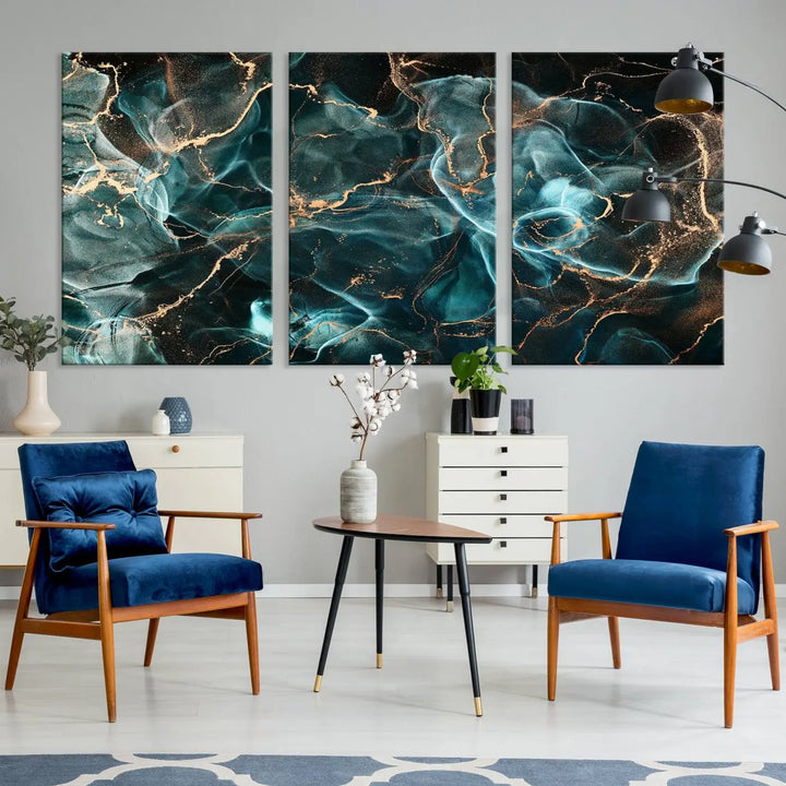 The "Neon Blue Marble Smokey Effect" abstract canvas wall art print, adorned with teal and gold swirls, is professionally hand-assembled with a UV-protective coating.