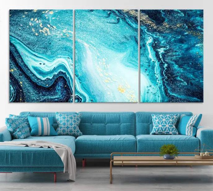 The Neon Blue and Gold Marble Fluid Effect Wall Art Abstract Canvas Wall Art Print graces the wall, displayed on museum-quality canvas.