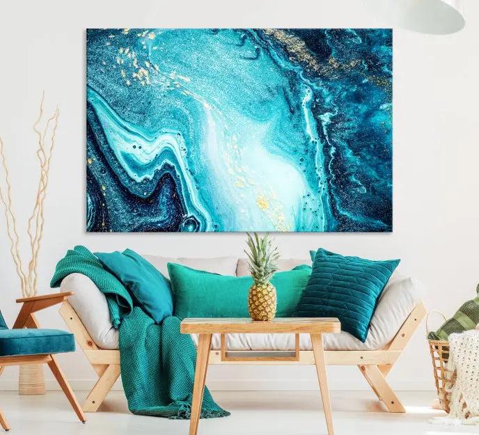 The Neon Blue and Gold Marble Fluid Effect Wall Art Abstract Canvas Wall Art Print graces the wall, displayed on museum-quality canvas.