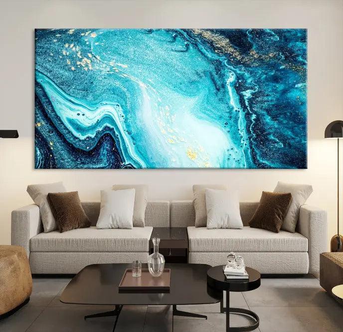 The Neon Blue and Gold Marble Fluid Effect Wall Art Abstract Canvas Wall Art Print graces the wall, displayed on museum-quality canvas.