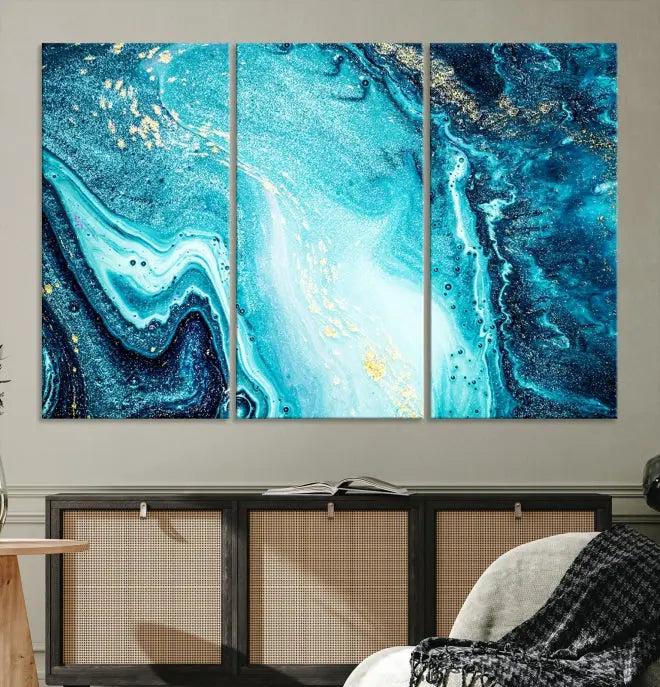 The Neon Blue and Gold Marble Fluid Effect Wall Art Abstract Canvas Wall Art Print graces the wall, displayed on museum-quality canvas.