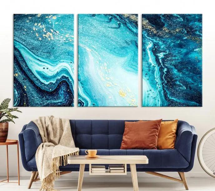 The Neon Blue and Gold Marble Fluid Effect Wall Art Abstract Canvas Wall Art Print graces the wall, displayed on museum-quality canvas.