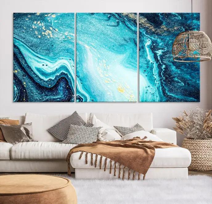 The Neon Blue and Gold Marble Fluid Effect Wall Art Abstract Canvas Wall Art Print graces the wall, displayed on museum-quality canvas.