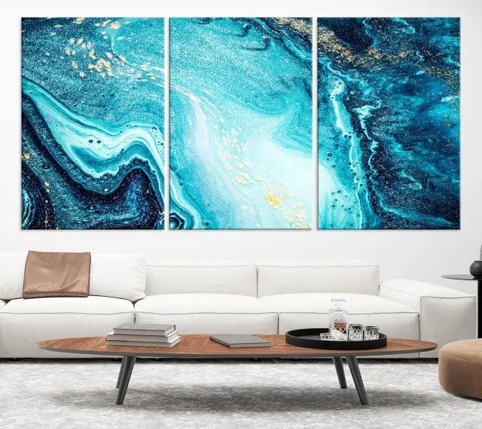 The Neon Blue and Gold Marble Fluid Effect Wall Art Abstract Canvas Wall Art Print graces the wall, displayed on museum-quality canvas.