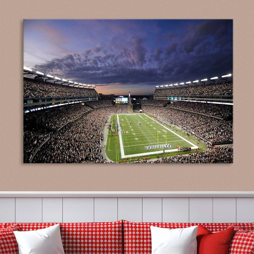 The living room showcases a remarkable set of canvases, the "New England Patriots Football Team Print - Foxborough Gillette Stadium Wall Art Canvas Print." This triptych captures a crowded football stadium at sunset, and each piece is coated with UV-protective layers to ensure lasting vibrancy. Additionally, you can enjoy the benefit of free shipping with your purchase.