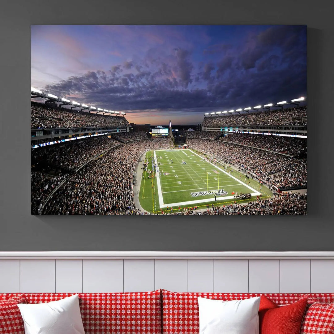 The living room showcases a remarkable set of canvases, the "New England Patriots Football Team Print - Foxborough Gillette Stadium Wall Art Canvas Print." This triptych captures a crowded football stadium at sunset, and each piece is coated with UV-protective layers to ensure lasting vibrancy. Additionally, you can enjoy the benefit of free shipping with your purchase.